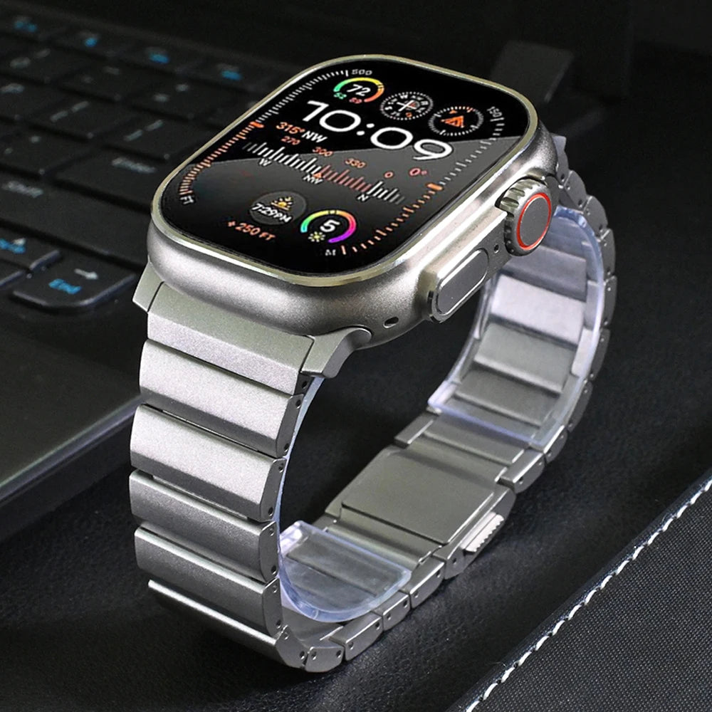 Stainless steel Apple Watch band attached to an Apple Watch, showcasing a modern and stylish design. Compatible with multiple series.