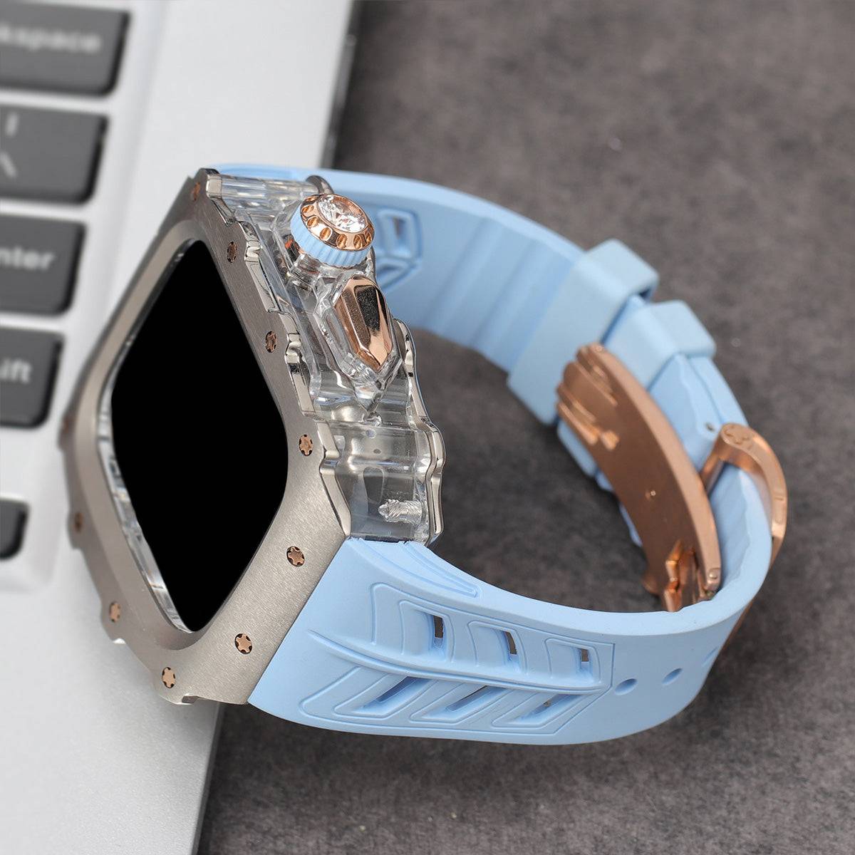 Apple Watch Series 10 Mod Kit with light blue band and rose gold accents.