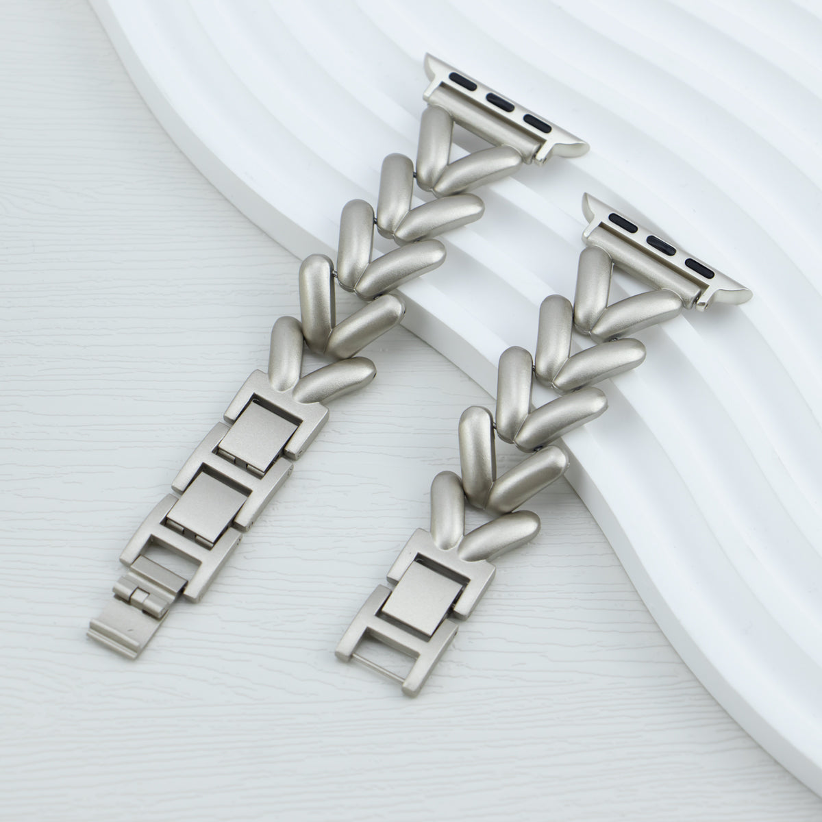 Chevron-style stainless steel links for Starlight Apple Watch Band, compatible with Series 10/9/8/7/6/5/4/SE/Ultra.