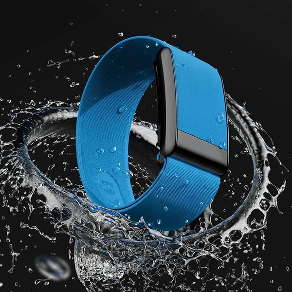 Whoop 4.0 nylon band in blue, showcasing breathable material and water resistance in a dynamic splash effect.