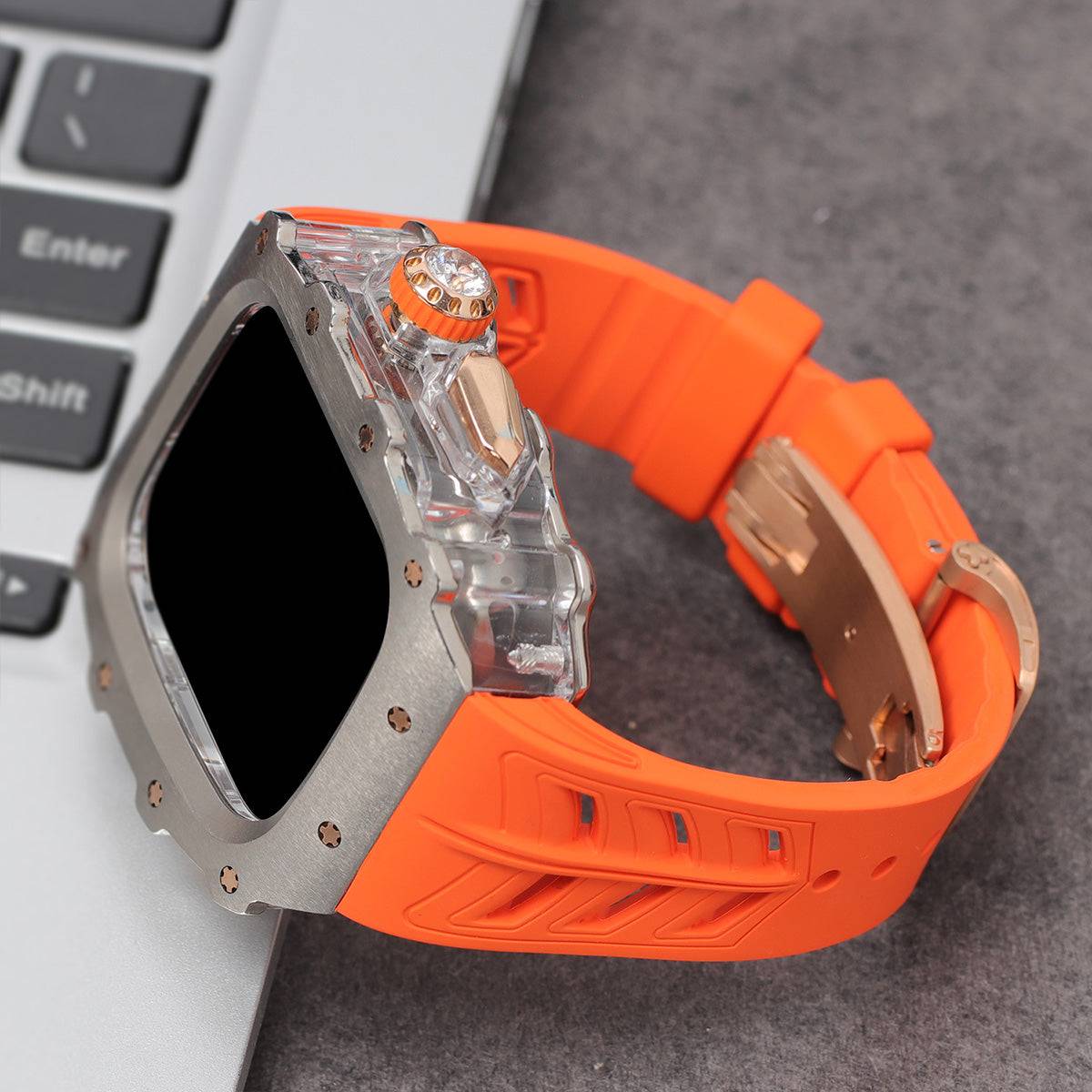 Apple Watch Series 10 Mod Kit with orange band and rose gold accents.